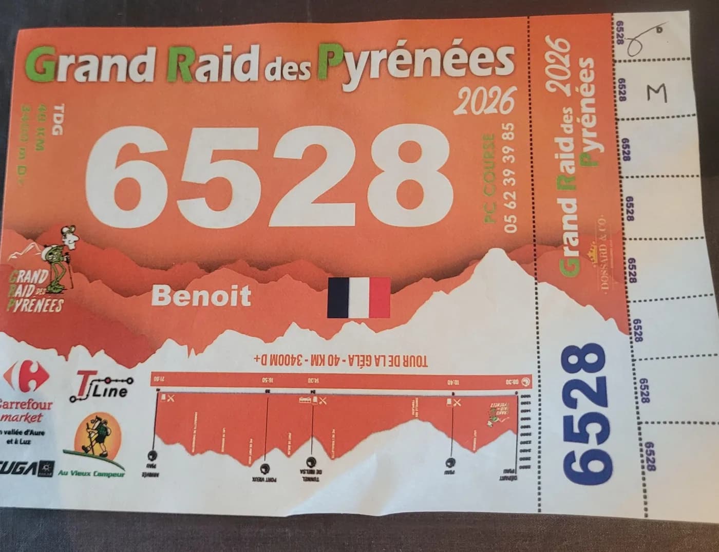 My bib from the Grand Raid des Pyrénées 2026: Tour de la Géla, 40 km, 3,400 m of climbing. Benoit, founder of AdvenBook.